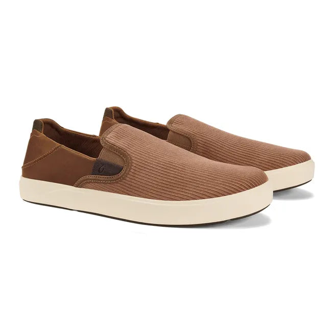 Pair of Men's Olukai Laeahi Kapa slip on shoe in brown with a white sole