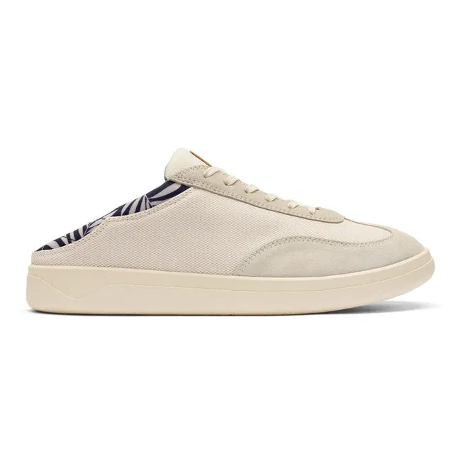 Lateral side of Men's Olukai Punini Shoe in Off White Aloha upper with the collapsible heel down