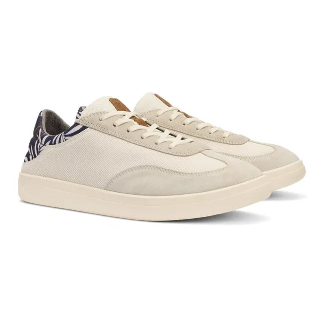 Pair of Men's Olukai Punini Shoe in Off White Aloha upper with a white sole
