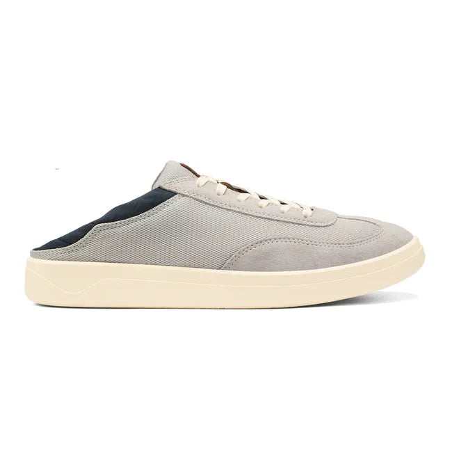 Lateral side of Mens Olukai Punini Shoe in Vapor gray and Trench Blue with the collapsible heel down