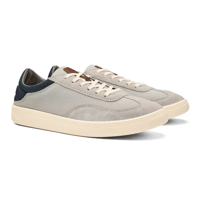 Pair of Men's Olukai Punini Shoe in Vapor gray and Trench Blue with a white sole