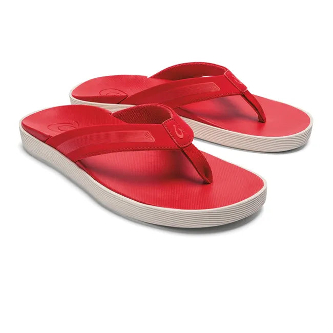 Pair of Men's Olukai Leeward Flip Flop Beach Sandal in red with a white sole