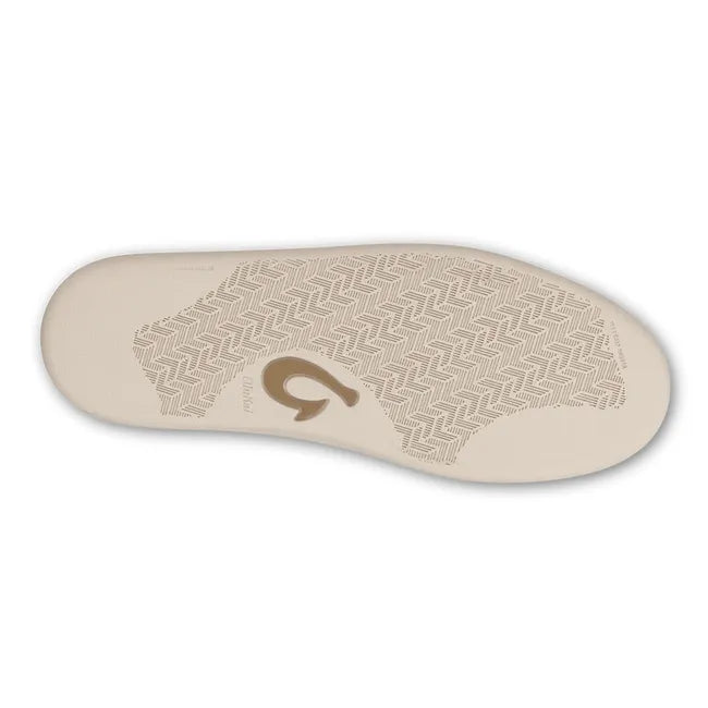 Sole of Men's Olukai Punini Suede Sneaker in Tan Toffee Suede with a white sole and tread