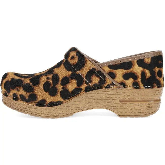 Dansko Professional clog in leopard haircalf, side profile showing rocker bottom
