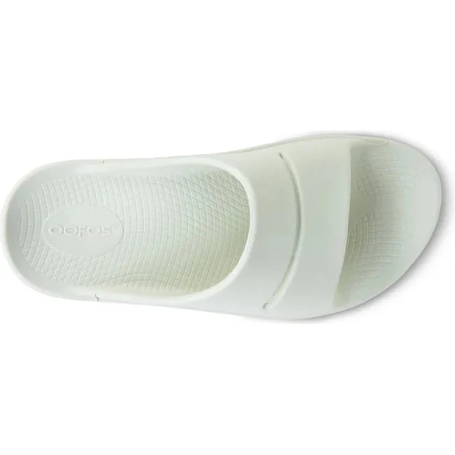 Top down view of Unisex OOFOS OOahh Slide Sandal in mint green