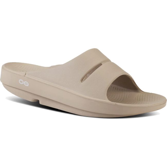 Front angled view of Unisex OOfos OOahh Slide Sandal in Nomad Beige
