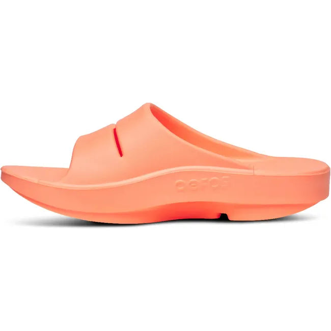Medial side of Unisex OOfos OOahh Slide Sandal in Sunburst Orange