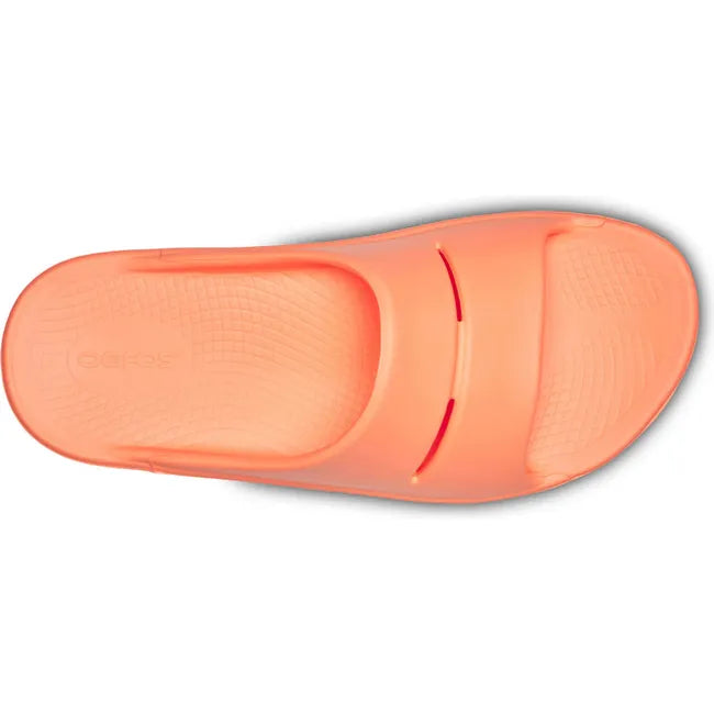 Upper of Unisex OOfos OOahh Slide Sandal in Sunburst Orange