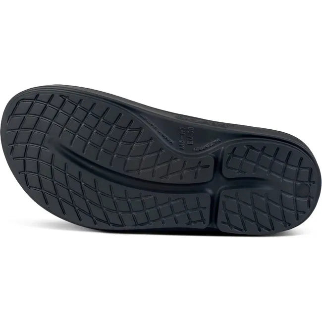 Black sole of Women's OOfos OOahh Luxe Slide Sandal in Frost silver and blue