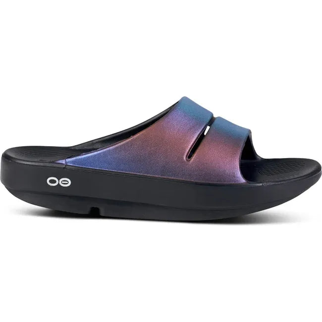 Lateral side of Women's OOFOS OOahh Luxe Slide Sandal in midnight spectre multi color