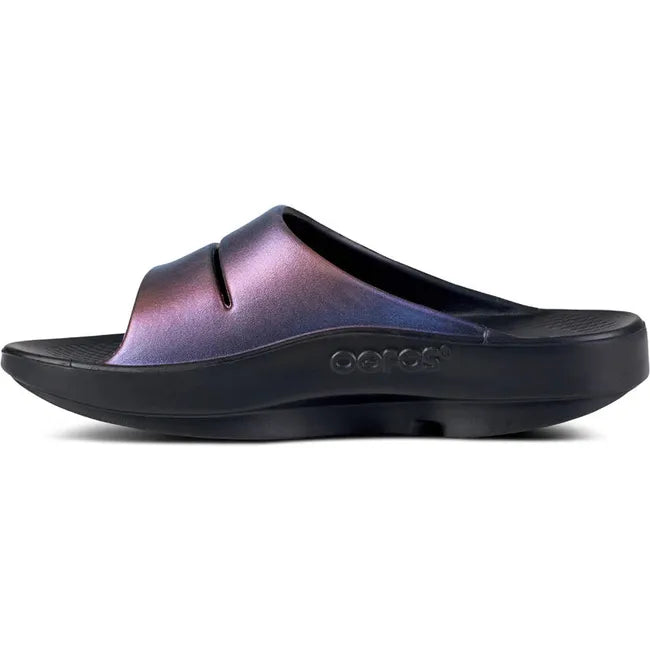 Medial side of Women's OOFOS OOahh Luxe Slide Sandal in midnight spectre multi color