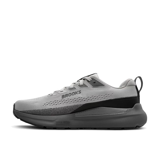 Medial profile of Brooks Beast GTS 26 in grey and blackened pearl showing broad base midsole stack and perforated mesh upper