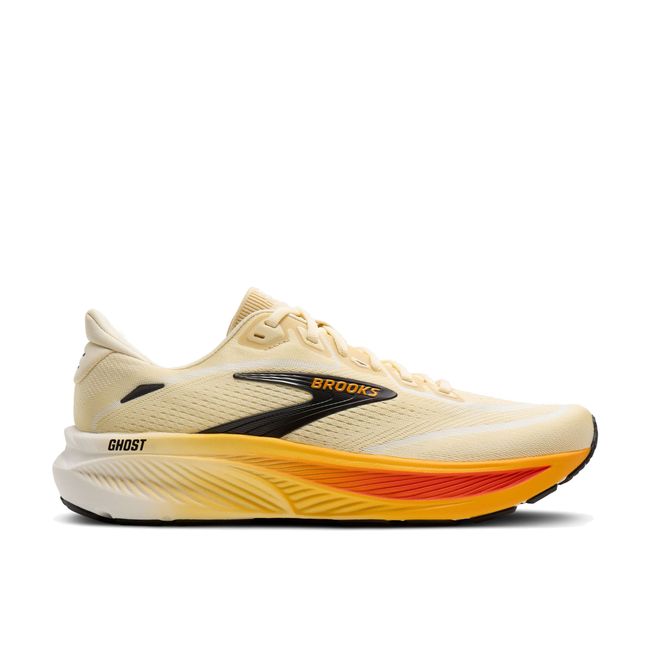 Lateral profile of Brooks Ghost 18 men's shoe in cream showing orange and red gradient midsole and RoadTack outsole