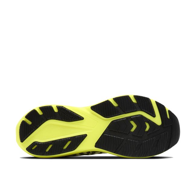 Brooks Ghost AMP outsole in neon Nightlife yellow showing SpringRamp traction pattern