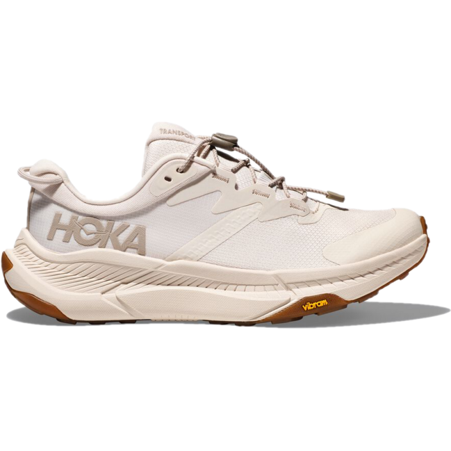 Lateral side of Hoka Women's Transport Lifestyle Shoe in eggnog color with bungee laces
