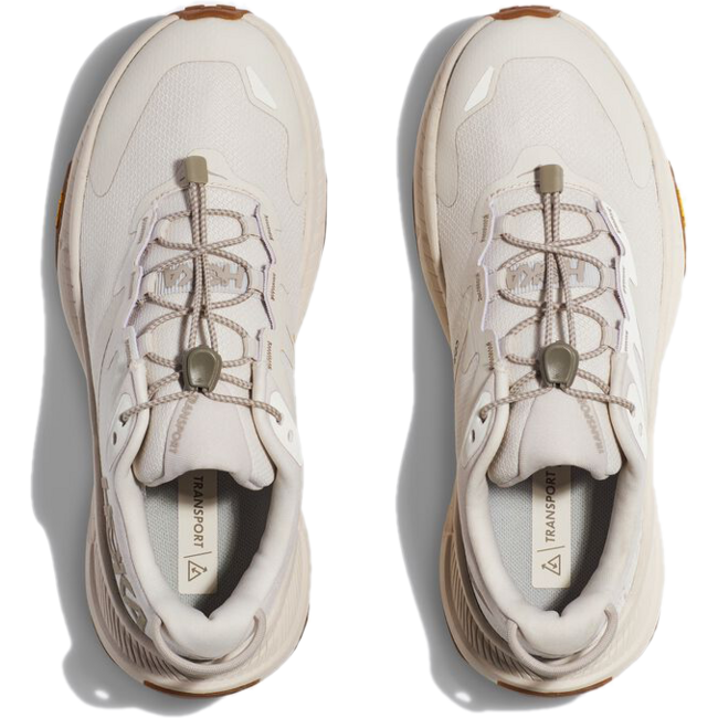 Top down view of Hoka Women's Transport Lifestyle Shoe in eggnog color with bungee laces
