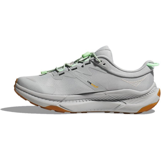 Medial side of Hoka Women's Transport Lifestyle Shoe in gray color with bungee laces