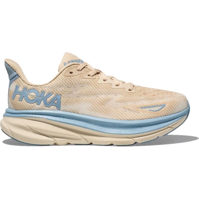 Lateral side of Women's Hoka Clifton 9 Running Shoe in Oak Alabaster tan and blue colors