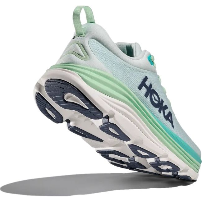 Heel angled up showing tread of Hoka Women's Gaviota 5 Running Shoe in Snow Melt Gray and Cielo Blue