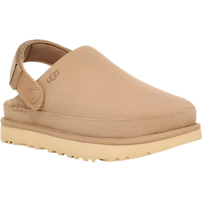 Front angled view of Women's Ugg Goldenstar Clog in sand suede with adjustable heel strap