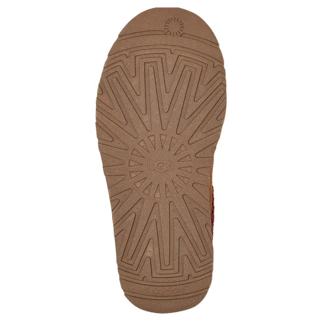 Brown sole of UGG Youth Tazz Slipper in Chestnut Brown