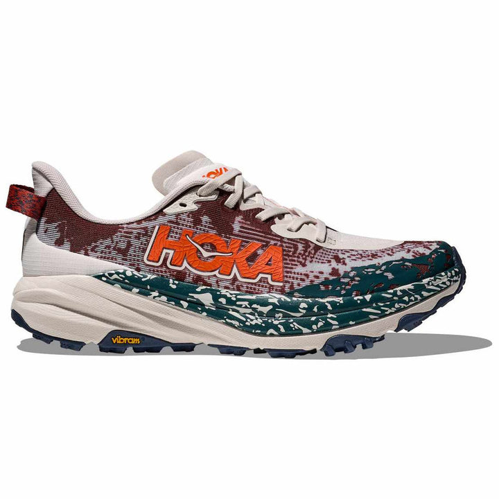 Lateral profile of Hoka Speedgoat 6 in putty blue showing Vibram Megagrip outsole and woven upper