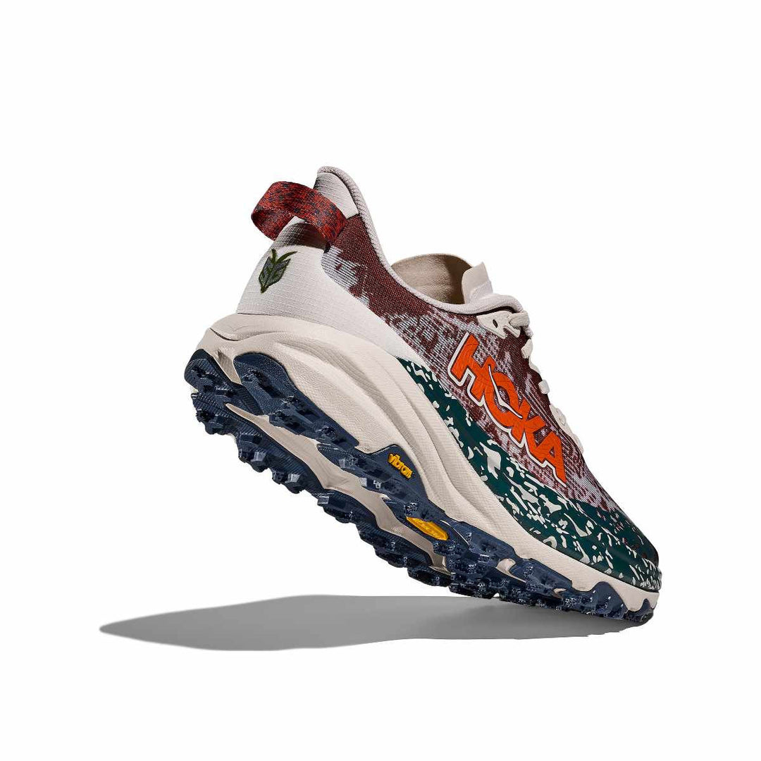 Hoka Speedgoat 6 Vibram Megagrip outsole in navy showing 5mm revised lug traction pattern