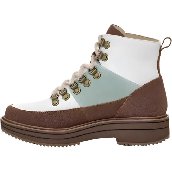 Medial side of Women's Teva Midform Boot Patchwork Waterproof with brown, white, and green patches. 