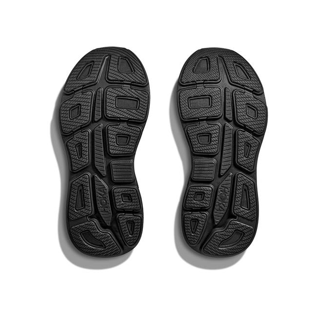 Soles of Women's Hoka Bondi 9 Running Shoes in all black with a thick cushioned midsole and tread