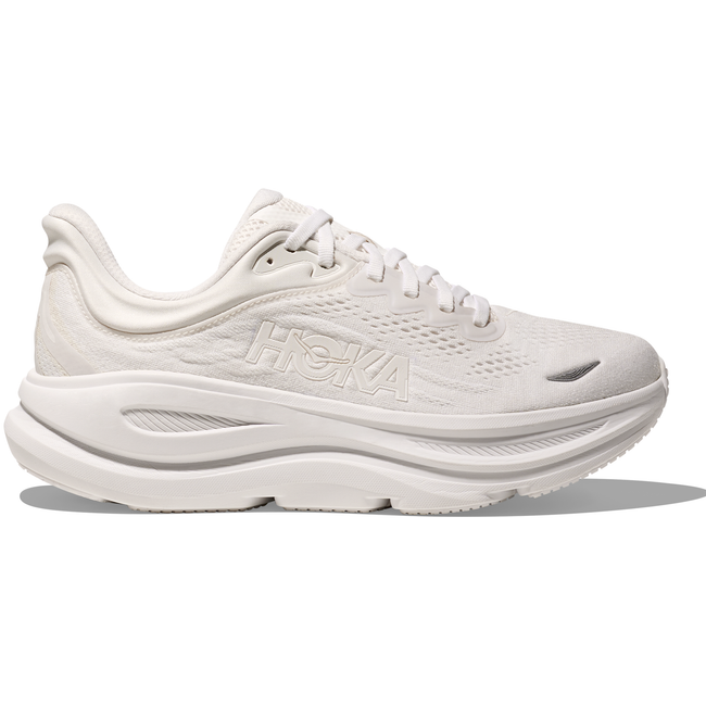 Lateral side of Women's Hoka Bondi 9 Running Shoe in all white with a thick cushioned midsole