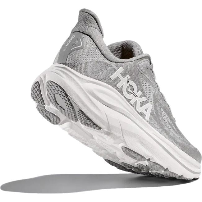 Heel angled up showing sole of Men's Hoka Clifton 10 Running Shoe in Stellar Grey Stardust