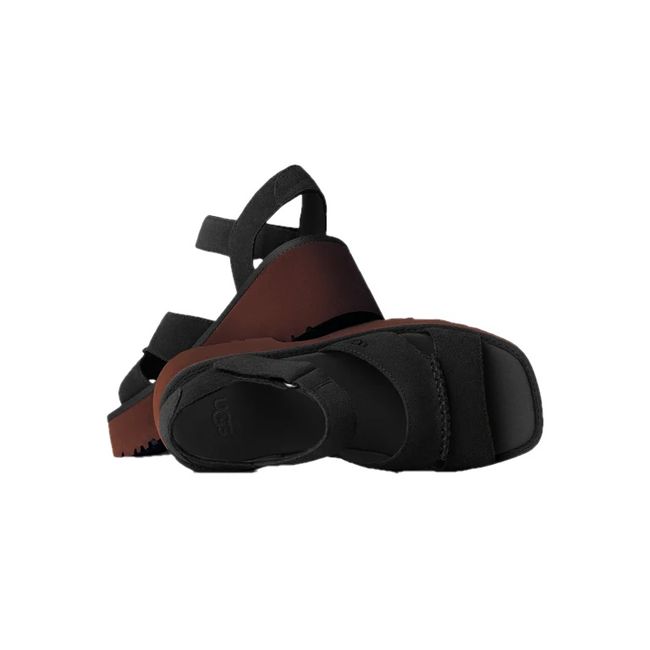 Upper and sole of UGG Women's New Heights Ankle Strap Sandal in Black Suede with Brown sole