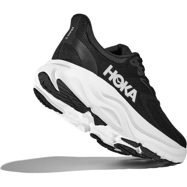 Heel angled up showing sole of Men's Hoka Arahi 8 Running Shoe in Black and White