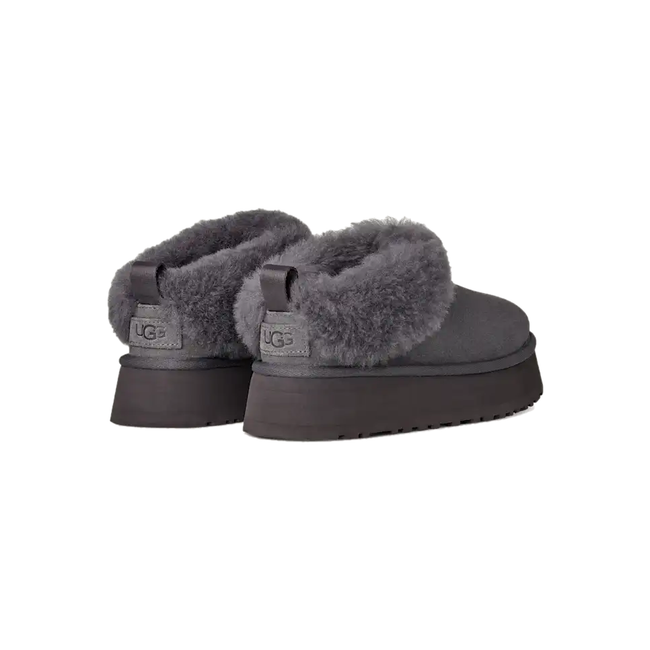 Heel of paired Ugg Women&#39;s Tazzelle Slipper in Obsidian Black