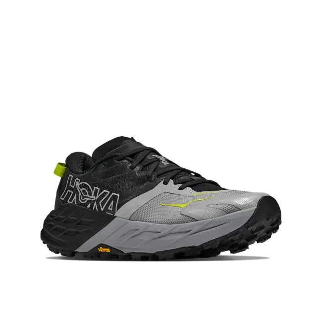 Lateral profile of HOKA Men's Speedgoat 7 in Black and Stellar Grey