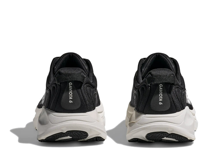 Hoka Mens Gaviota 6 running shoe pair in Black/White, rear heel view with white midsole
