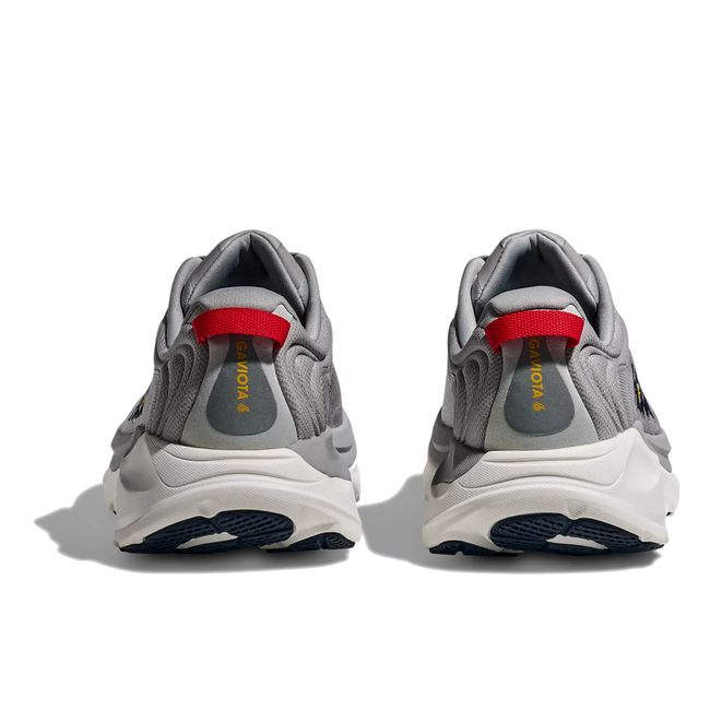 Hoka Mens Gaviota 6 running shoe pair in Stellar Grey, rear heel view with red pull tabs