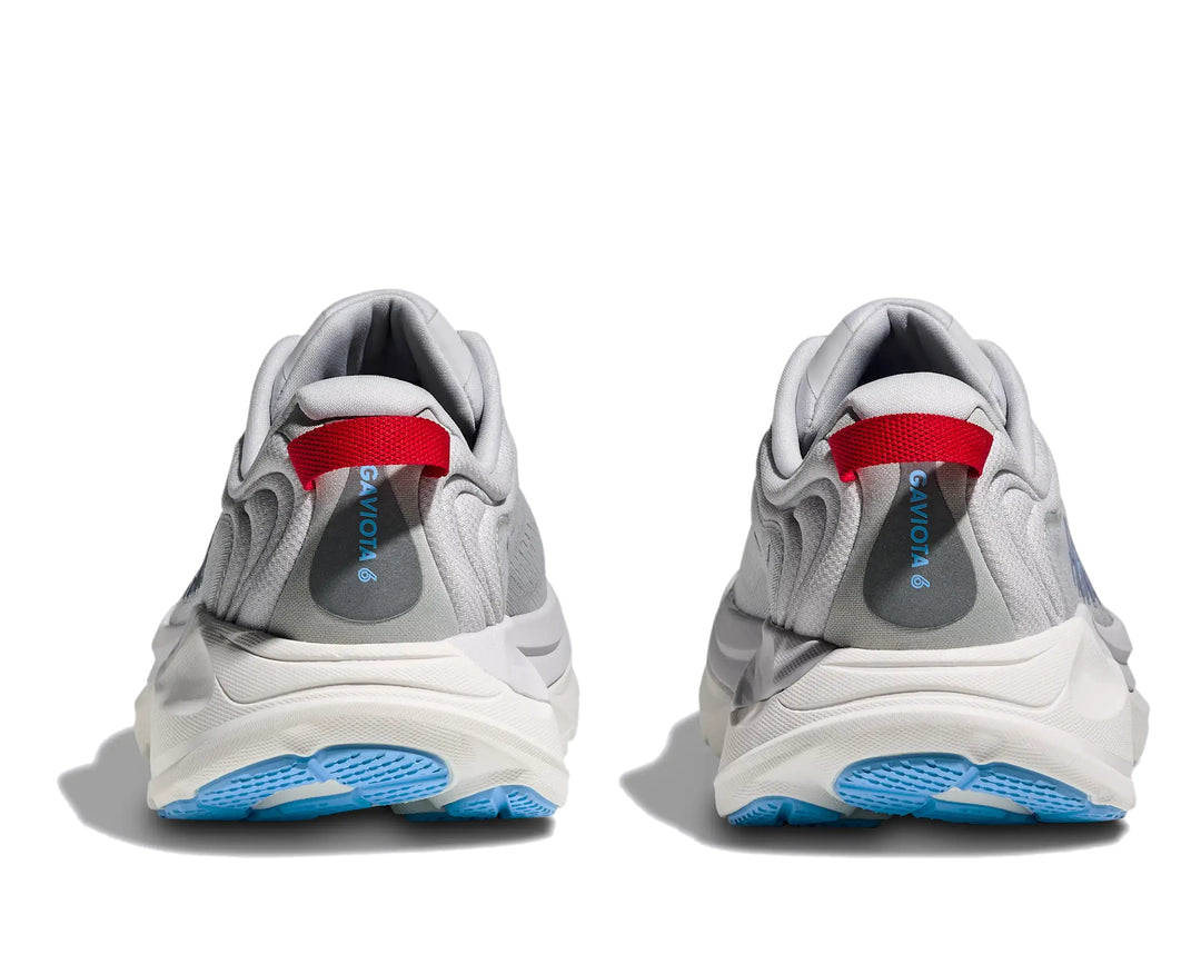 Hoka Womens Gaviota 6 running shoe pair in Cosmic Grey, rear heel view with red pull tabs