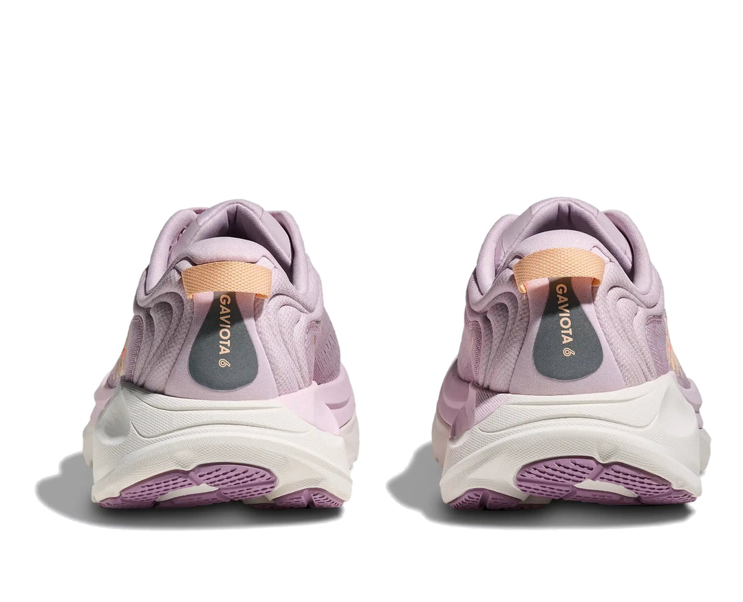 Hoka Womens Gaviota 6 running shoe pair in Lilac Cream, rear heel view with peach tabs