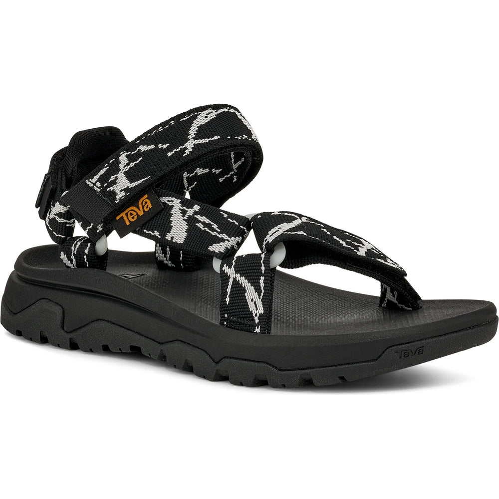 Front angle of Teva Kids' Hurricane XLT Jr Sandal in Marble Black/Grey