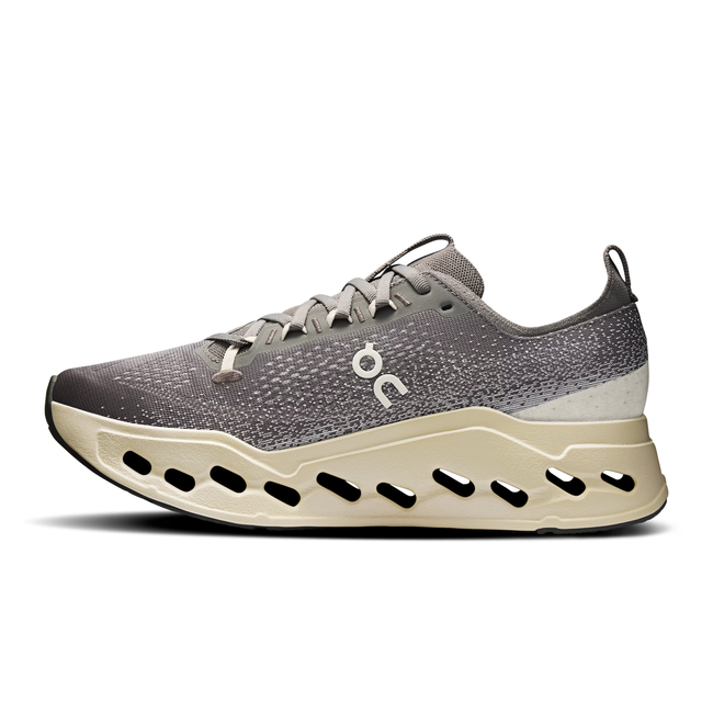 Medial side of On Running Men's Cloudsurfer Max Running Shoe Grey Asphalt Ice