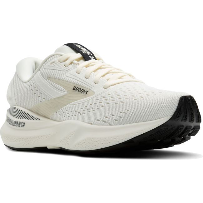 Cream-colored Brooks Adrenaline GTS 24 running shoe with black accents