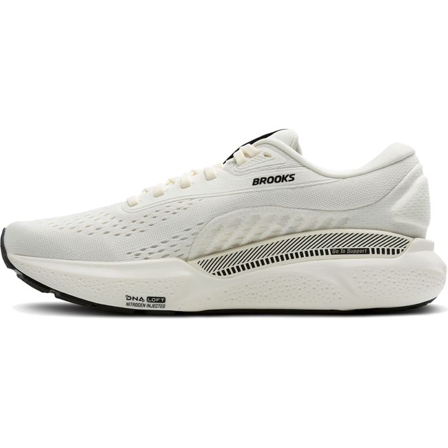 Medial side of Cream-colored Brooks Adrenaline GTS 24 running shoe showing the supportive GuideRail