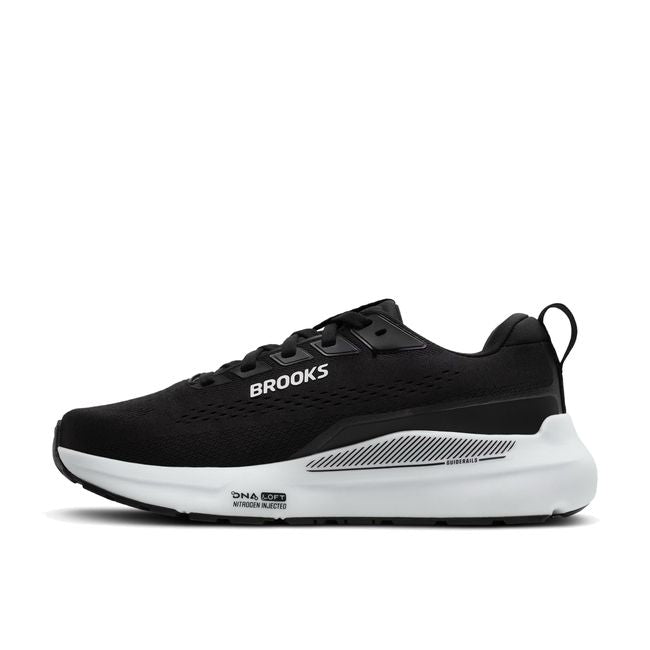 Medial profile of Brooks Ariel GTS 26 in black and grey showing broad base midsole stack and mesh upper