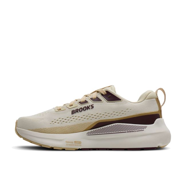 Medial profile of Brooks Ariel GTS 26 in coconut and sand showing GuideRails support structure and broad base midsole