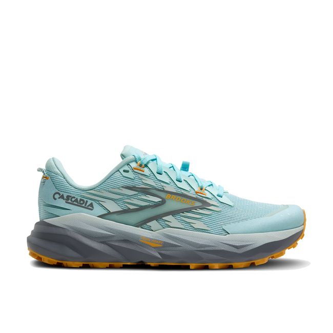 Side view of Brooks Women’s Cascadia 19 trail running shoe in blue with grey cushioned midsole.