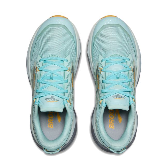 Lace upper of Brooks Women’s Cascadia 19 trail running shoe in blue with grey cushioned midsole.