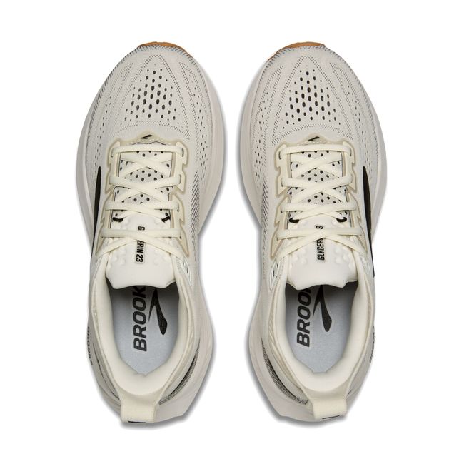 Top-down pair of Brooks Glycerin 23 in white showing speckled knit mesh upper and black lace detail