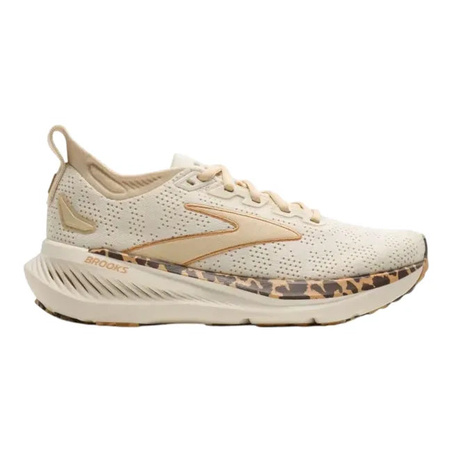 Lateral profile of Brooks Glycerin 23 women's shoe in cream showing leopard print midsole wrap and tan knit upper