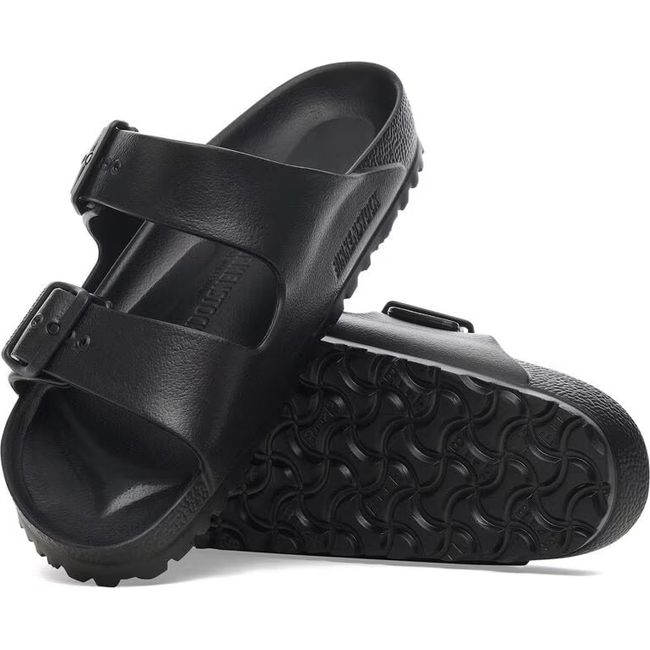 Birkenstock Arizona EVA Black Two Strap Sandals. One shows the sole and the other the upper